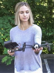 woman holding drone
